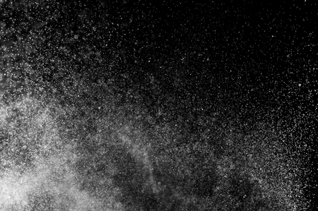 abstract splashes of water on a black backgroundの写真素材