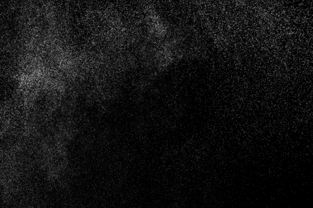 abstract splashes of water on a black background. splashes of milk. abstract spray of water. abstract rain. shower water drops.  white dust explosion. abstract texture. abstract black background.の写真素材