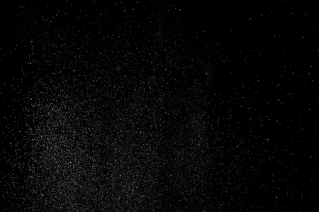 abstract splashes of water on a black background. abstract spray of water. abstract rain. shower water drops. abstract texture.の写真素材