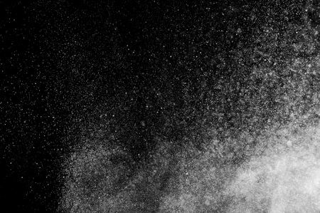 abstract splashes of water on a black background. abstract spray of water. abstract rain. shower water drops. abstract texture.の写真素材