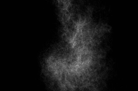 abstract splashes of water on a black background. abstract spray of water. abstract rain. shower water drops. abstract texture.の写真素材
