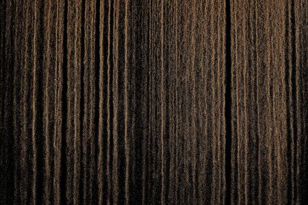 Sandy wave isolated on black background. Abstract sand dune.