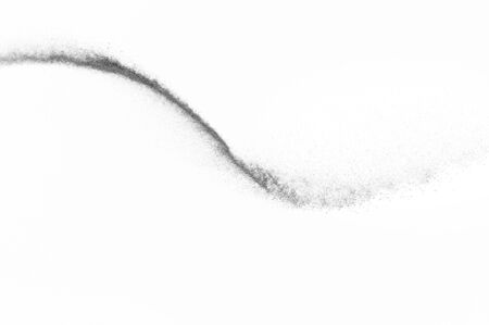 Black particles explosion isolated on white background.  Abstract dust overlay texture.の写真素材