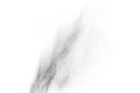 Black particles explosion isolated on white background.  Abstract dust overlay texture.の写真素材