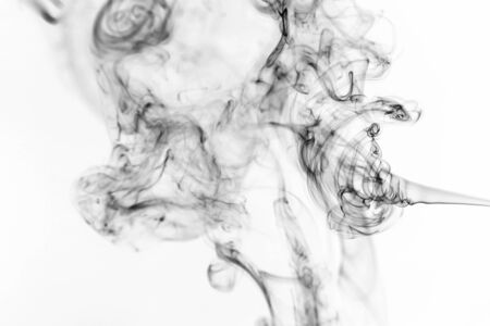 Smoke on black background.  Abstract vape clouds. Freeze motion.の写真素材