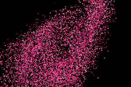 Scarlet explosion of confetti isolated on black. Valentines Day background. Pink glitter texture.  Vector illustration,eps 10.のイラスト素材