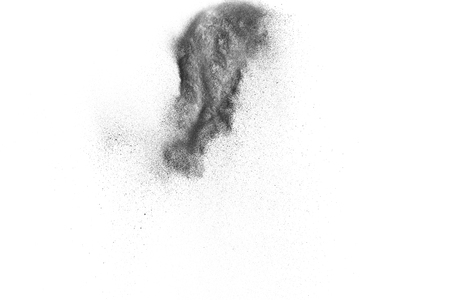 Black particles explosion isolated on white background.  Abstract dust overlay texture.の写真素材