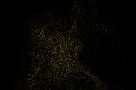 Gold Glitter Texture Isolated on Black Background. golden stardust. Amber Particle Color. Sparkles Rain. Vector illustration, Eps 10.のイラスト素材