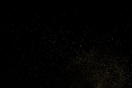 Gold Glitter Texture Isolated on Black Background. golden stardust. Amber Particle Color. Sparkles Rain. Vector illustration, Eps 10.のイラスト素材