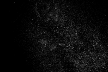 Distressed white grainy texture. Dust overlay textured. Grain noise particles. Snow effect. Rusted black background. Vector illustration, EPS 10.のイラスト素材