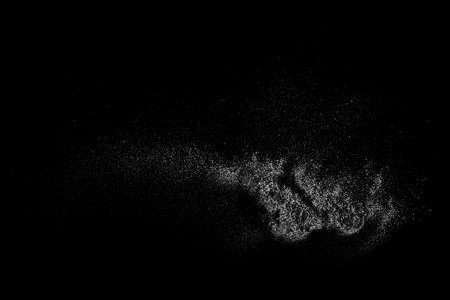 Snow effects. Water splash on black background. Dust overlay effect. White spray texture. Abstract explosion. Vector illustration, EPS 10.のイラスト素材