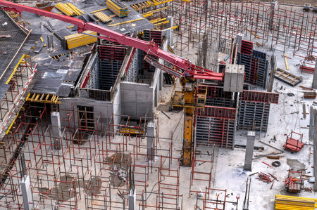 Construction site without workers. Construction of high-rise building, skyscrape, of a block of flats of the monolithic residential apartment building. Top view.の写真素材