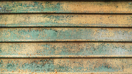 Abstract wall grunge background. Green paint texture pattern. Old rusty metal sheet texture.の写真素材