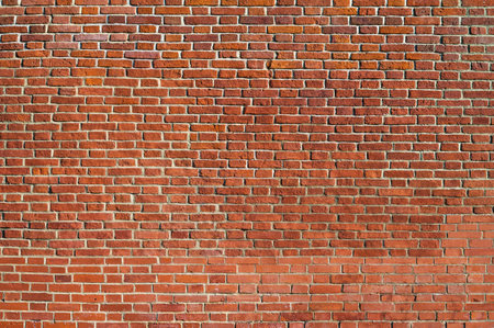 Red brick wall background. Old brickwork texture. Rock block pattern. Vintage stonewall. Abstract grunge urban design. Building masonry backdrop.の写真素材