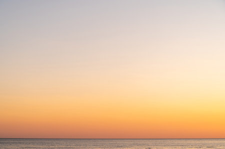 Sunset sea beach. Sun sky ocean. Sunrise water landscape. Clouds nature horizon wave coast. Evening beautiful orange dusk.の写真素材