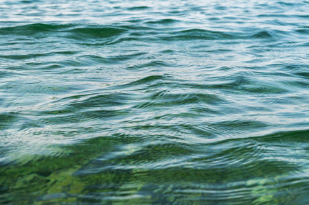 Water blue sea. Lake wave surface. Ocean texture abstract. Waves ripple reflection sunset.