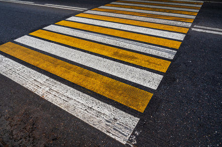 Cross walk empty. Pedestrian crossing. Asphalt road background. Crosswalk top view. Road surfaces and highways.の写真素材