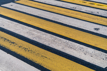 Cross walk empty. Pedestrian crossing. Asphalt road background. Crosswalk top view. Road surfaces and highways.の写真素材