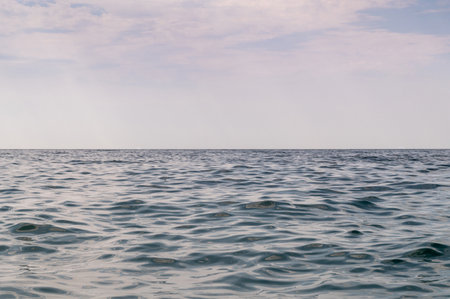 Sea water sky. Ocean horizon clouds. Nature summer seascape. Blue cloud wave landscape.の写真素材