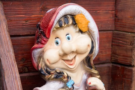 Dwarfs decorate the garden near the house. Sculptures fabulous dwarves.の写真素材