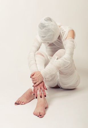 Young beautiful woman with bandageの写真素材