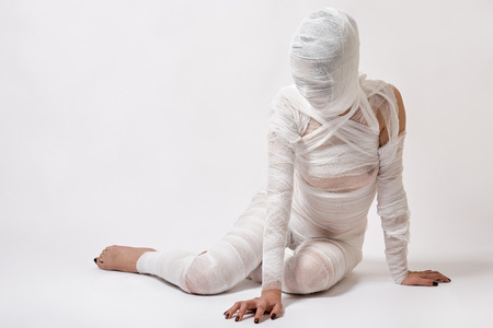 Slim young beautiful woman with bandagesの写真素材