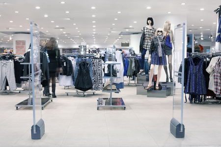 Shoppers at shopping center, motion blurの写真素材