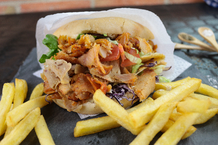 Kebab with tomato on black backgroundの写真素材