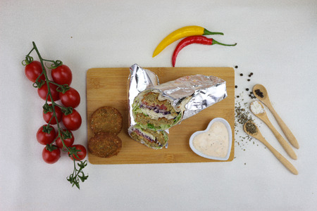 Kebab with tomato on white backgroundの写真素材