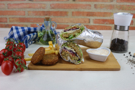 turkish kebab durum wigh black backgroundの写真素材