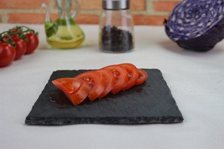 fresh tomatoes product on tableの写真素材