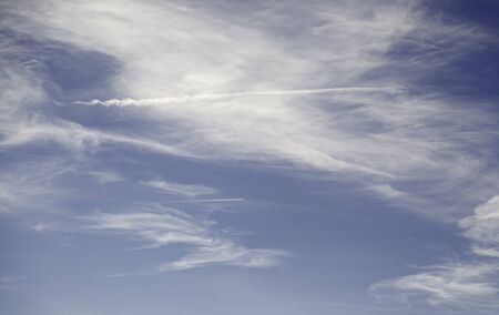 Blue sky with clouds and plane, beauty, air transportの写真素材