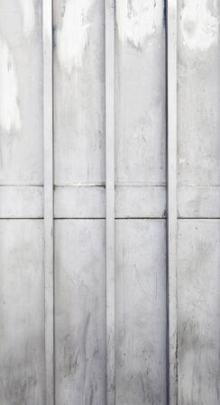 Old metallic background, detail of old rusty metal door, detail in the city, abandonedの写真素材