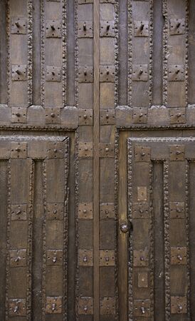 Old wooden door, old door detail of classic wood texture background with historicalの写真素材