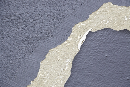 Painted wall damaged, background with texture detail on a wall, paint damagedの写真素材