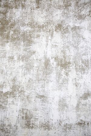 Dirty cement wall, detail of a concrete wall in the city, construction textured backgroundの写真素材