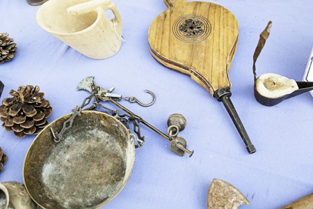 Bellows and ancient balance, detail of some old tools in a town of Spain, classic and outdatedの写真素材