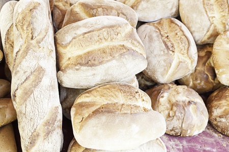 Traditional breads, detail of different types of bread in a position in a Spanish market