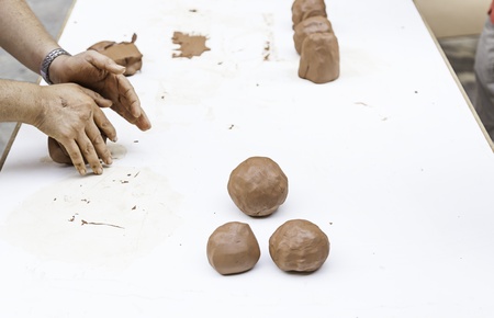 Hands working with clay, detail of a ceramic worker, Anigua tradition, potteryの写真素材