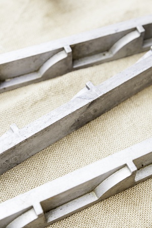 Antique metal molds, detail of molds for metal tools
