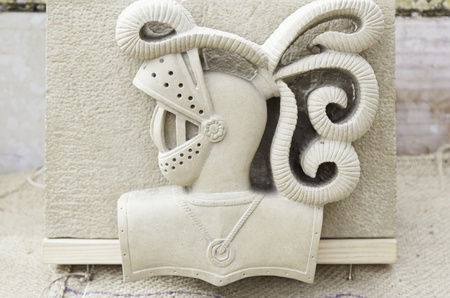 Medieval stone carving, detail of a medieval knight's head, traditional arts and craftsの写真素材
