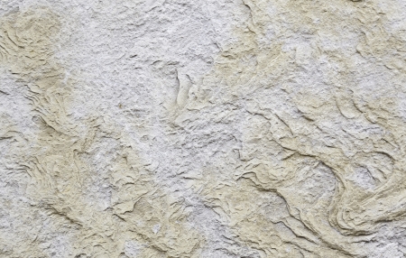 Stone background with texture detail of a natural stone wall, protection and decoration, rough...