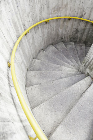Spiral staircase in the city, detail of modern architecture, urban lifeの写真素材