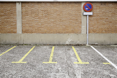 Signal not park on the street, detail of a road sign on a wall in the city, and safety informationの写真素材
