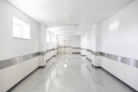 Deep hospital corridor, detail of a white corridor in a hospital, architecture and healthの写真素材