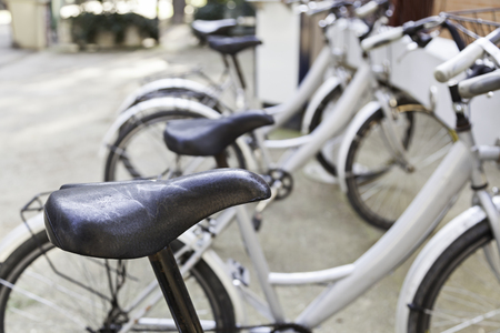 Stops in the city Bicycles, detail of a means of transportation on the street, health and environmentの写真素材