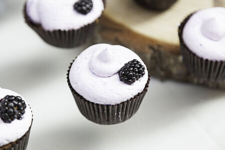 Sweet cupcakes decorated dessert detail flavors, colors and decoration, party and celebrationの写真素材