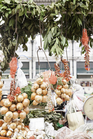 Garlic and onions at a market, detail of an old store vegetables food healthy lifestyleの写真素材