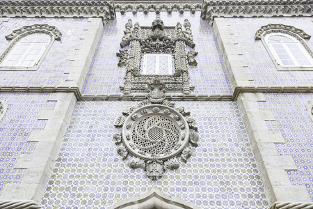 Old facade with typical tiles from Lisbon, detail of a decorated wall, typical architecture of Portugalの写真素材