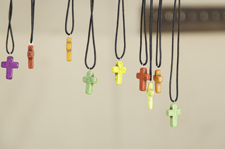 Pendants shaped cross, detail of a decoration comlpementos neck, belief and faithの写真素材